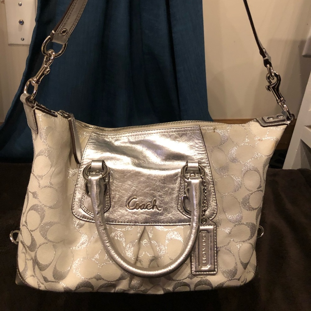 Silver and white coach satchel